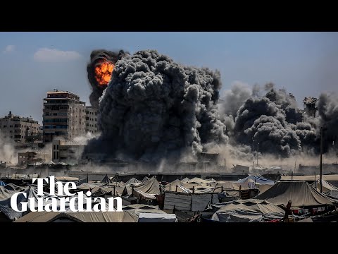 Palestinians flee from Israeli strike on evacuated residential tower in Gaza City