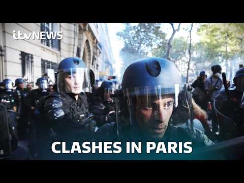 French police launch tear gas at protesters as country faces day of strikes | ITV News