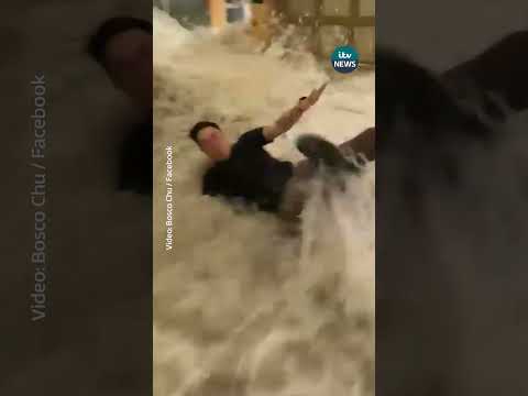 Moment wall of water bursts into hotel as super typhoon hits Hong Kong | ITV News