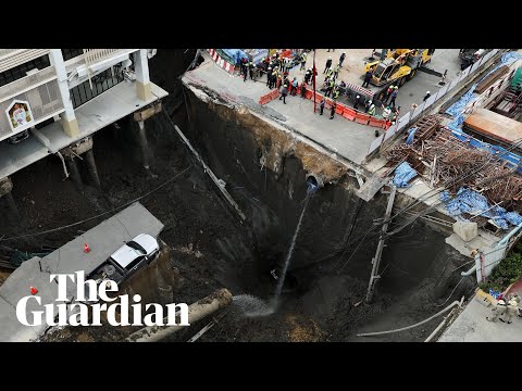Sinkhole swallows part of street in front of Bangkok hospital