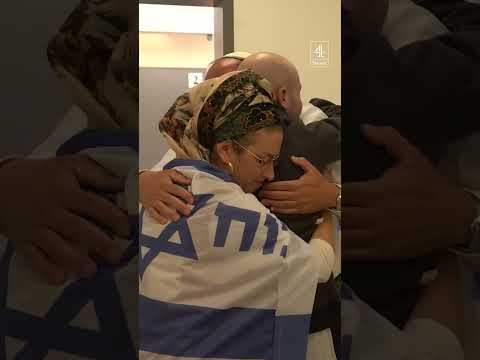 Israeli hostage reunites with family