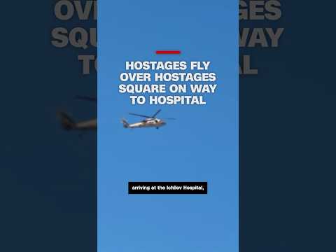 Hostages fly over Hostages Square on way to hospital