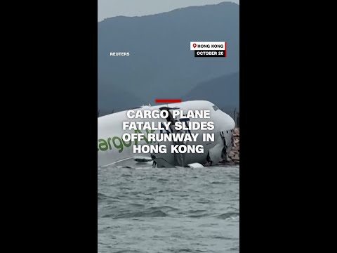 Cargo plane fatally slides off runway in Hong Kong