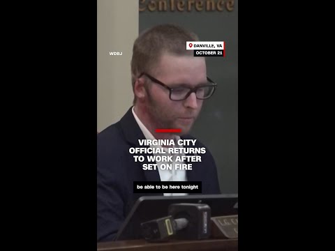 City official returns to work after set on fire