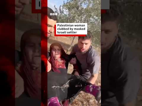 Palestinian woman clubbed by masked Israeli settler. #BBCNews