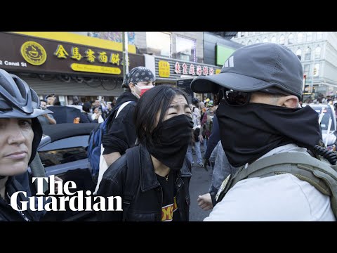 Protests erupt as Ice agents conduct raids in New York City’s Chinatown