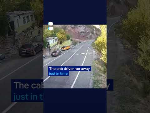 Cab driver narrowly escapes falling boulder | DW News