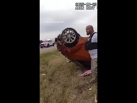 Dramatic moment of police rescuing infant trapped underneath car