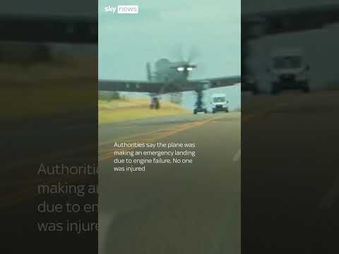 Moment US military plane nearly hits car