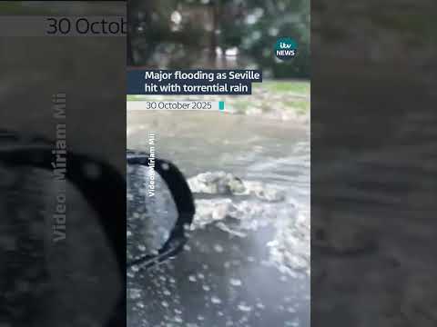 Vehicles submerged and drains overflow as Seville hit with torrential rain #itvnews