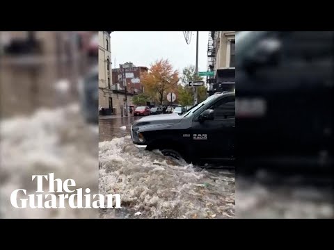 Heavy rain floods streets in New York City