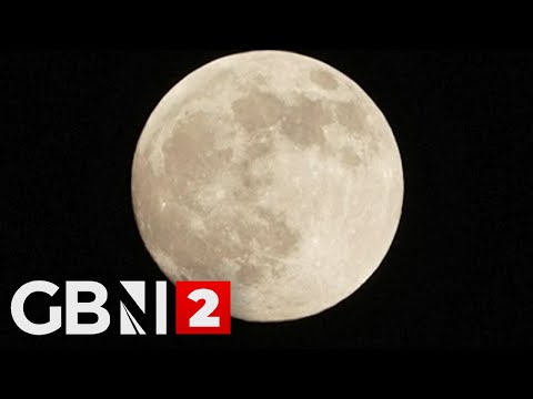 WATCH: A radiant supermoon casts a golden glow across Taipei’s high-rises