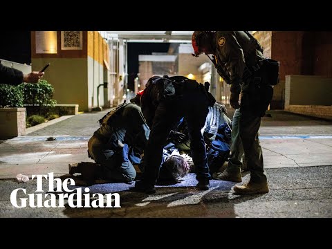 ‘I can’t breathe’: Protesters confront law enforcement officers in Portland