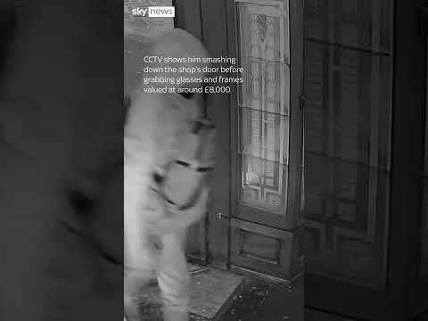 Moment police find burglar hiding in bin