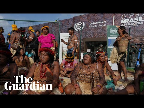 Indigenous protesters block entrance to Cop30 summit venue