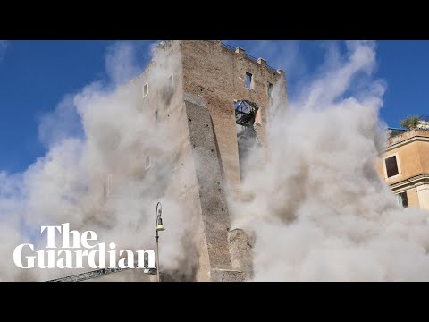 Moment part of medieval tower in Rome collapses