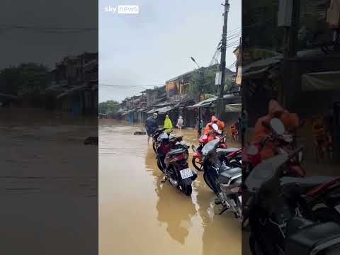 Man airlifted by drone as floods hit Vietnam