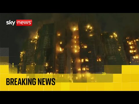 Fire engulfs high-rise building in Hong Kong