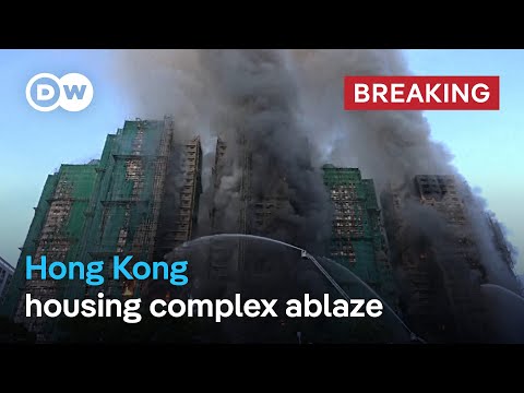 Massive fire engulfs residential building in Hong Kong |  DW News