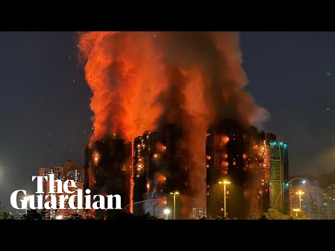 Several people trapped as fire engulfs residential complex in Hong Kong