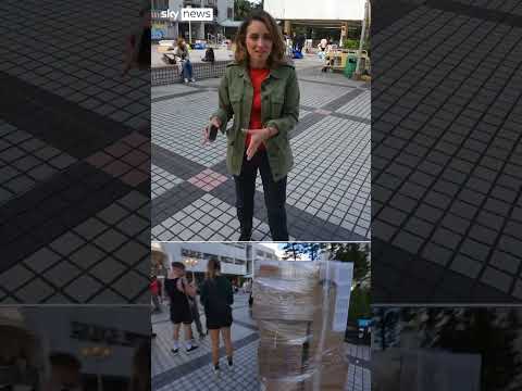 Hong Kong authorities clear out block fire volunteers