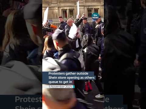 Protesters gather outside the opening of a Shein store, as others queue to get in #itvnews #paris