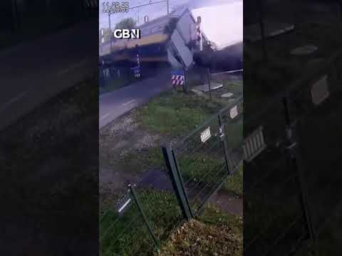 CCTV footage shows the moment a train SMASHES into a lorry at a Dutch level crossing