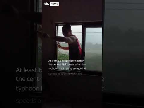 Filipinos stranded on roofs amid typhoon floods