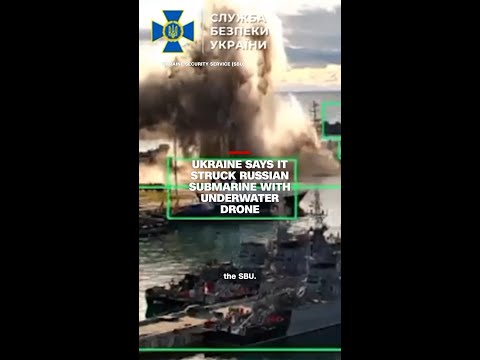Ukraine says it struck Russian submarine with underwater drone