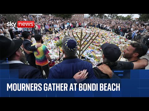 Mourners gather at Sydney’s Bondi Beach after terror attack