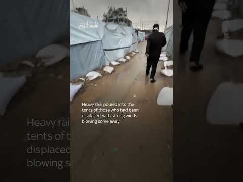 Cars trapped and tents blown away as floods hit Gaza City