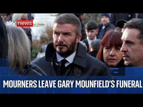 Mourners leave the funeral of The Stone Roses bassist Gary “Mani” Mounfield