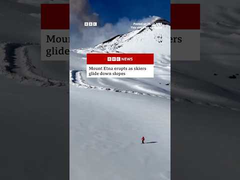 Mount Etna erupts as skiers glide down slopes. #Italy #Volcano #BBCNews