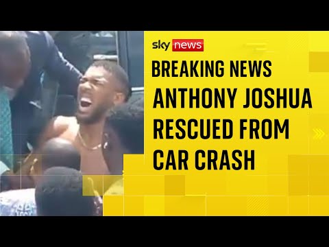Footage shows Anthony Joshua being helped from car after crash in Nigeria