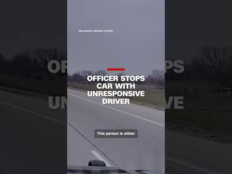 Officer stops car with unresponsive driver