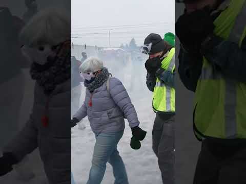 Protesters clash with police after deadly ICE shooting