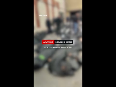 Body bags line the street outside morgue near Tehran