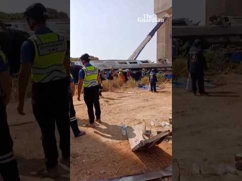 At least 22 killed after crane collapses on to train in Thailand