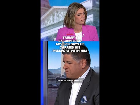 Trump’s ex-campaign adviser says he carries his passport with him