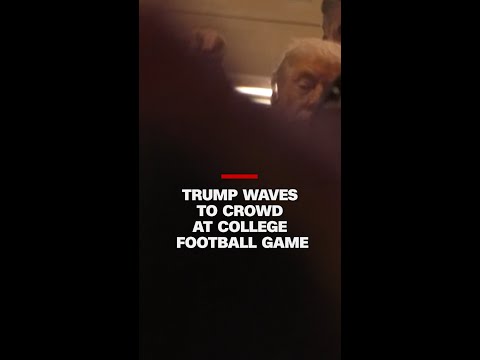 Trump waves to crowd at the College Football National Championship
