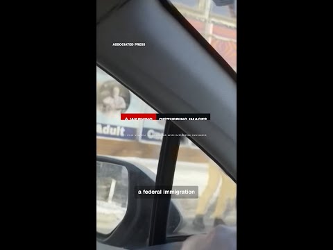 The moments before officers removed alleged gun from Pretti