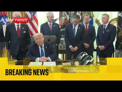 Donald Trump takes questions from reporters at the White House