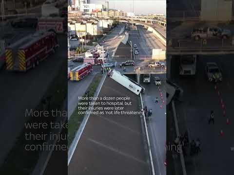 Bus wedged on embankment following collision