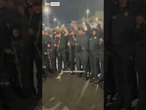 Armed men in Venezuela chant in allegiance to Maduro