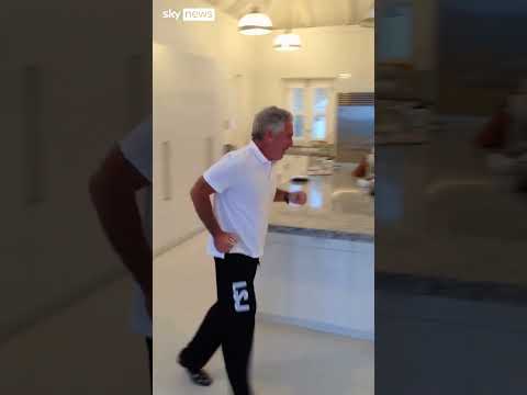 Video shows Epstein in kitchen of island home