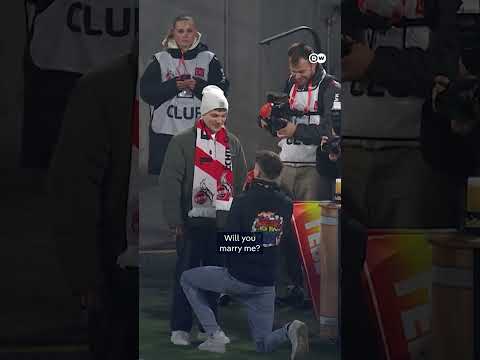 Queer football fan proposes at Cologne football stadium | DW News