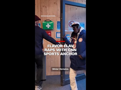 Flavor Flav raps with CNN Sports anchor