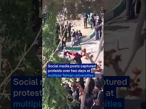 Opposing protesters clash at student protests at Tehran Universities | DW News