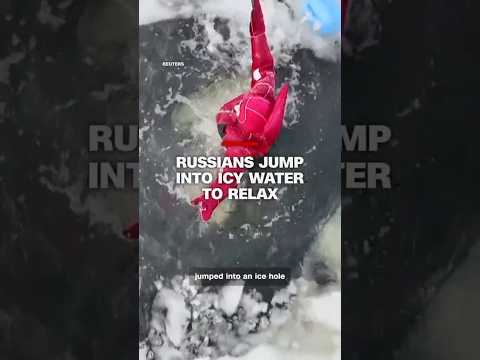 Russians jump into icy water to relax