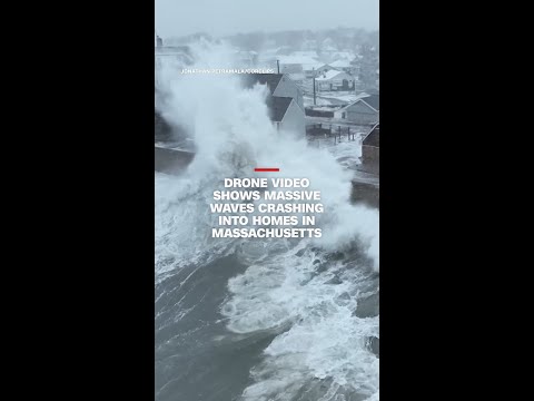 Drone video shows massive waves crashing into homes in Massachusetts